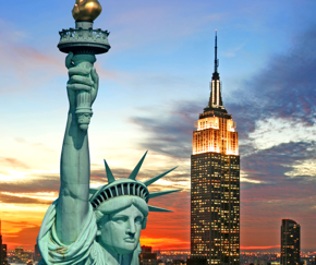 Statue of Liberty and Empire State Building at sunset – New York | Equity - the school travel people