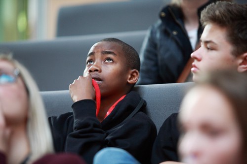 A student thinking during a trip