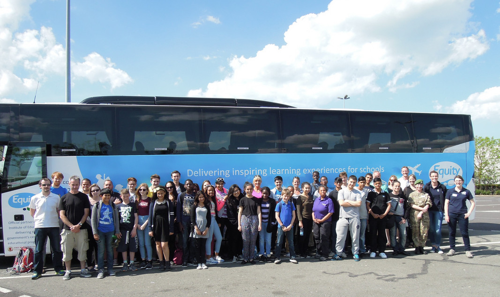 A group taking a coach on their school trip