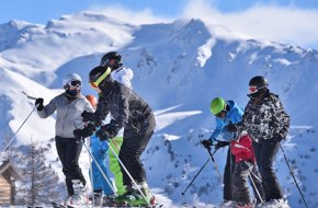 group of skiers resting on italian mountain | Equity - the school travel people