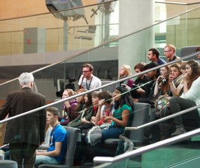 group of students in thought, sitting in a seminar | Equity - the school travel people